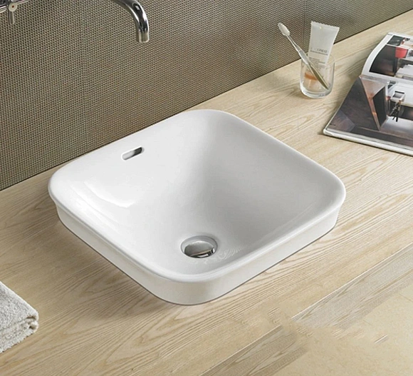 Фигурный умывальник Melana 2307